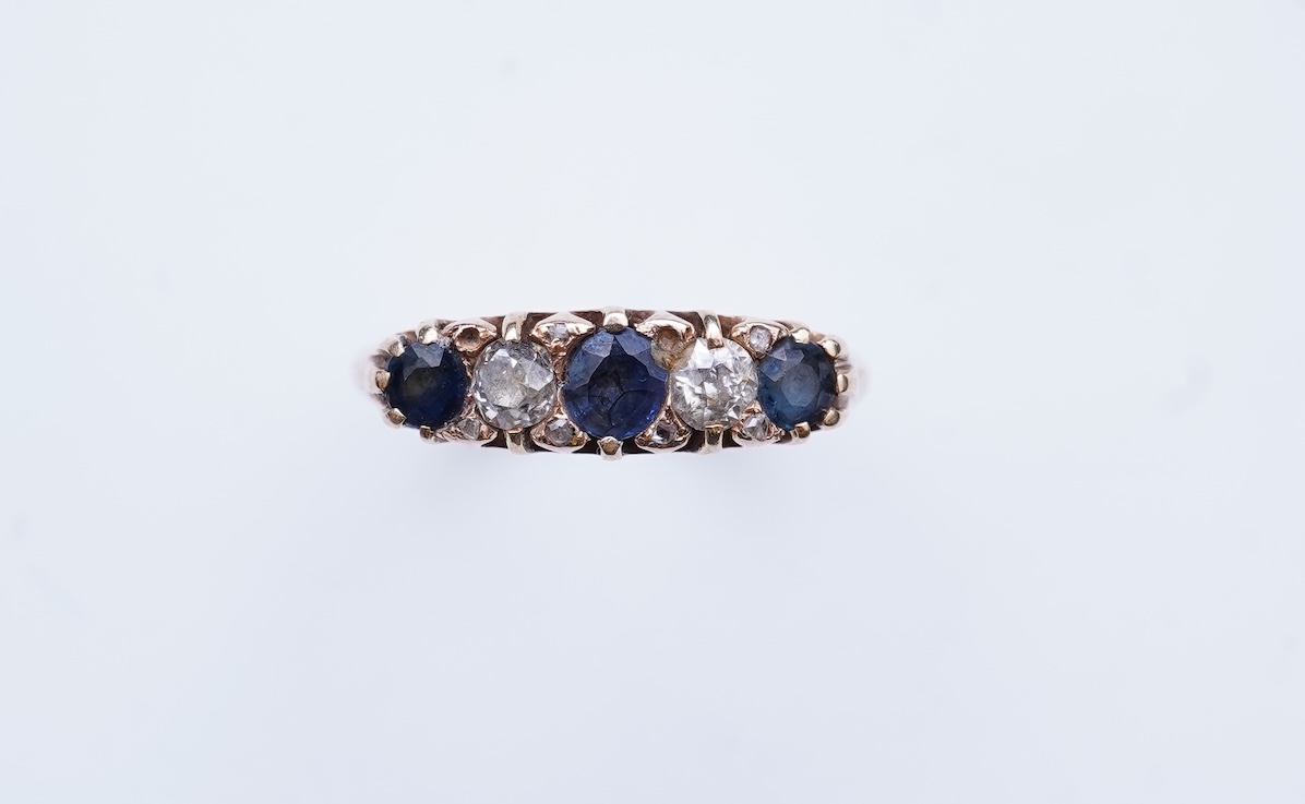 A sapphire and diamond five-stone ring, circa 1902